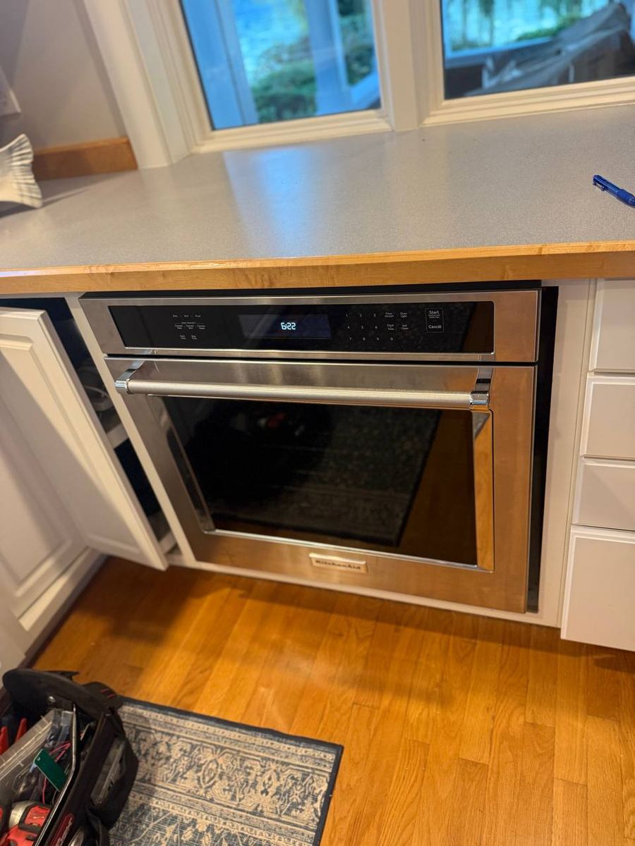 Built-in wall oven checked on a kitchen repair visit